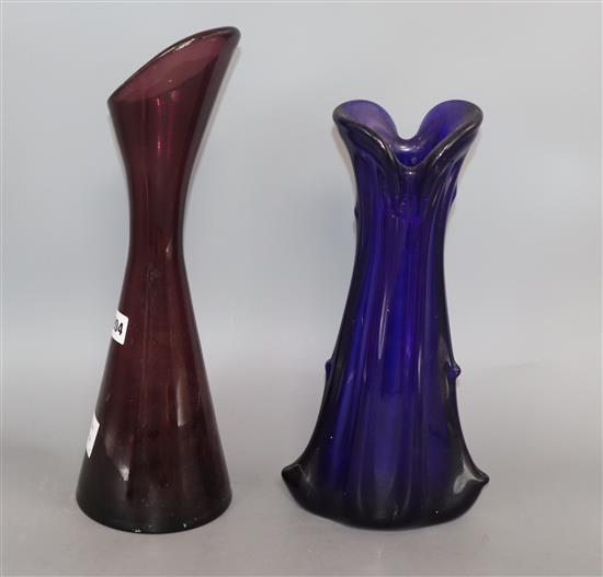 A 1950s amethyst glass vase and a knobbly blue glass vase height 40cm